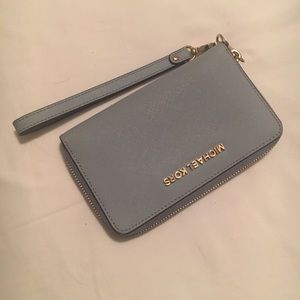 Michael Kors wallet with phone compartment.